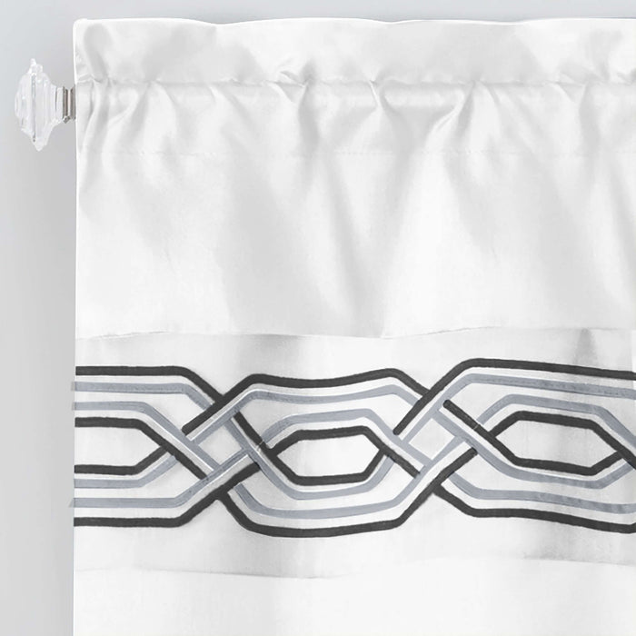 White window curtain valance with geometric design and rod pocket for easy hanging.