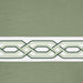 Green and white patterned window curtain valance with geometric design.